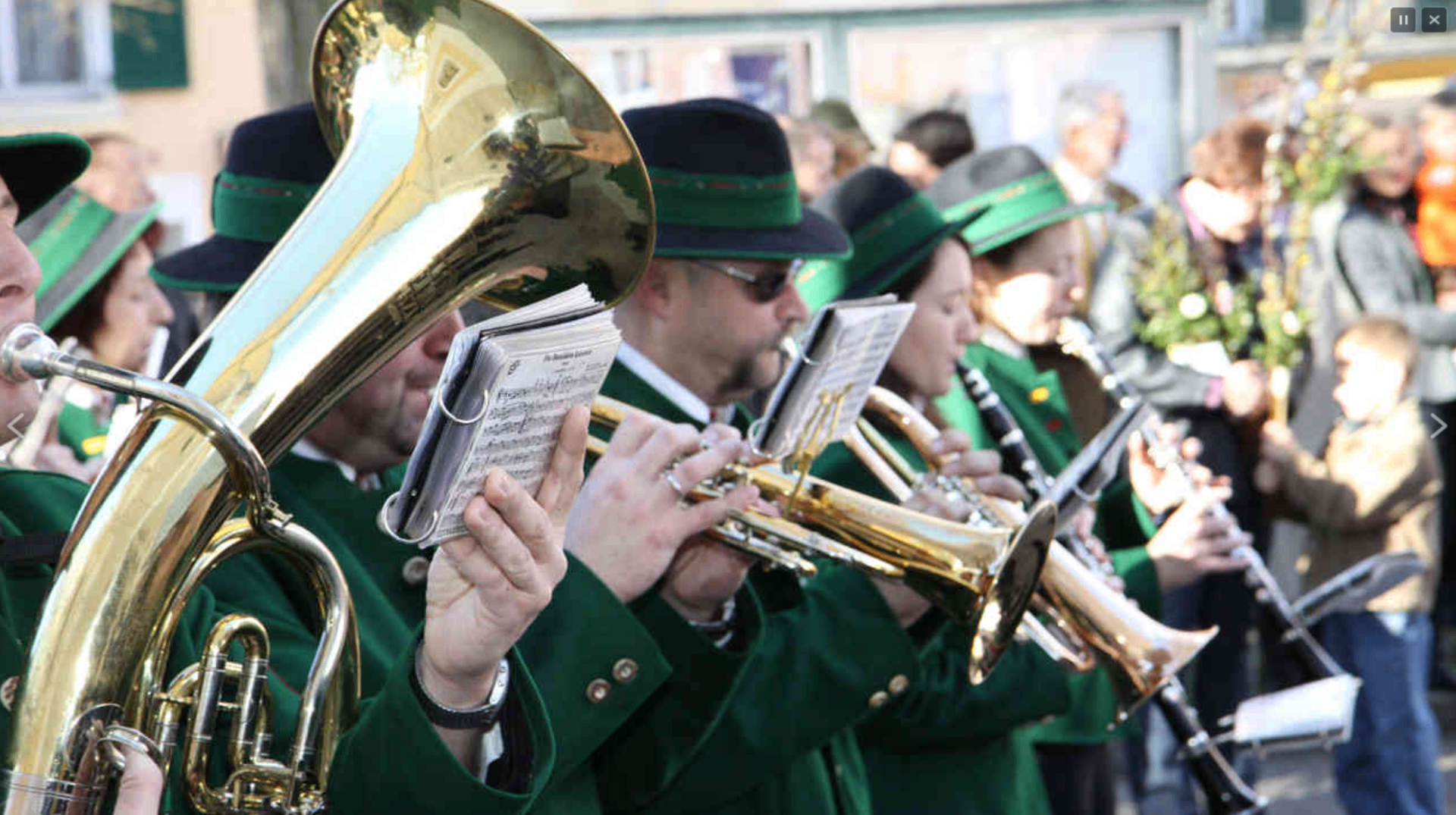 MGV Kirchberg an der Raab brass and wind musicians performing outdoors in traditional Styrian attire